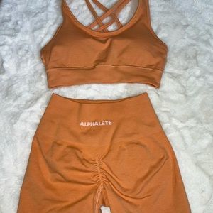 Alphalete Amplify cheeky coral shorts and sports bra